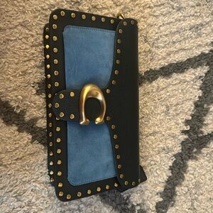 Coach tabby never used